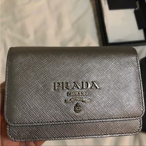 Prada mini crossbody bag on chain in color chromo…